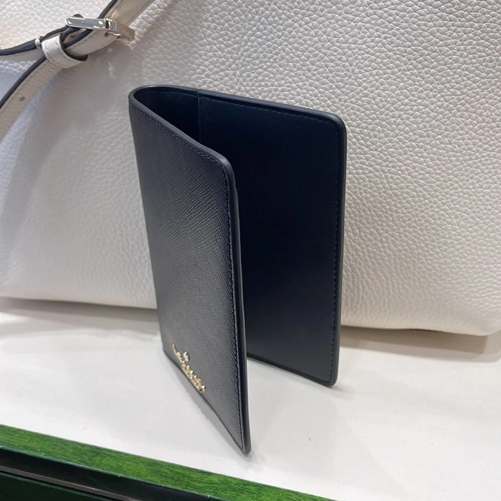 Kate Spade Madison Leather Passport Holder, Crush Proof, Black
NWT - Picture 9 of 16